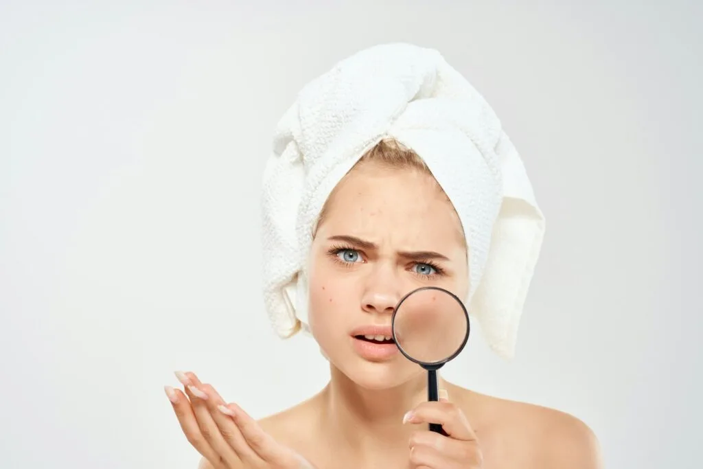 beautiful woman bare shoulders acne treatment Studio close-up